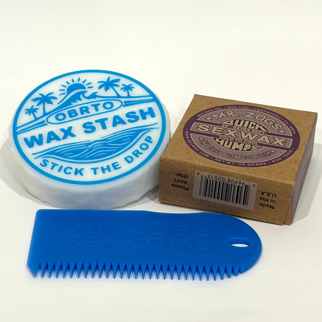 OBRTO Wax Stash with a blue wax comb and a bar of Mr. Zog's Sex Wax on a white background